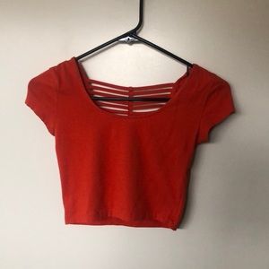 Orange crop top caged back cut out
